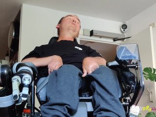 Wheelchair guy gets undressed by his nurse for a handjob