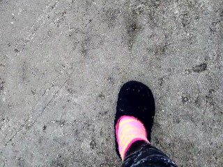 Fuzzy slippers and socks outside